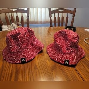 TWO identical reversible Carnival cruise lines players club hats.